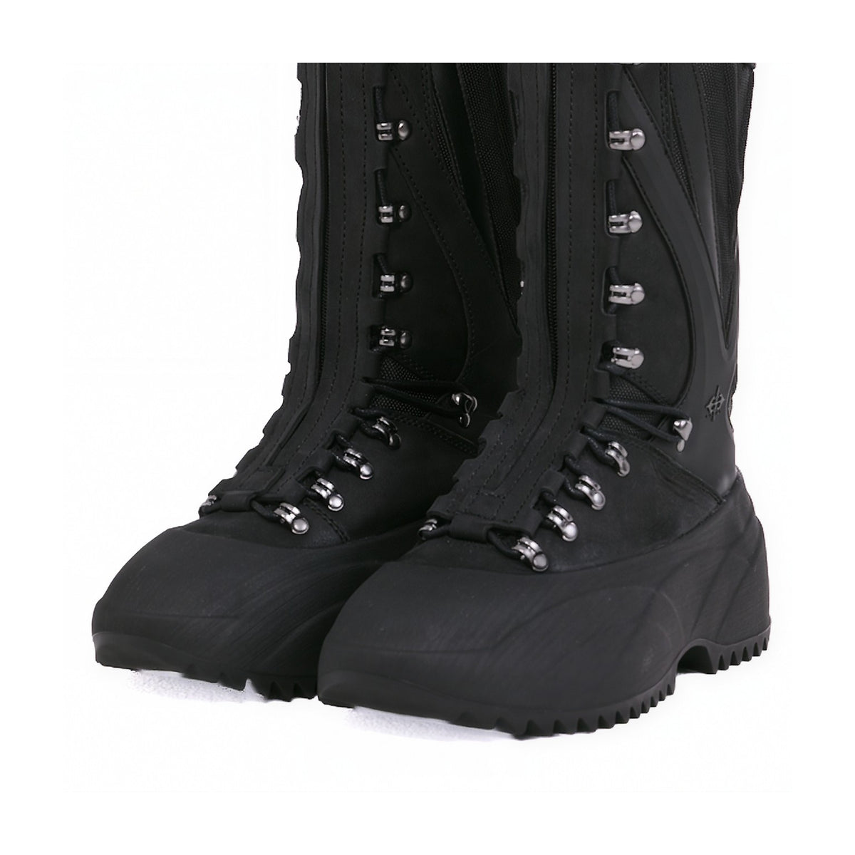 A pair of black tactical combat boots with silver metal eyelets and laces, shown from a three-quarters angle on a white background.